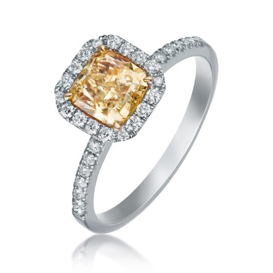 Elegant Silver Ring with Central Square Yellow Gemstone Surrounded by White Gems White Background Jewelry Product Photography