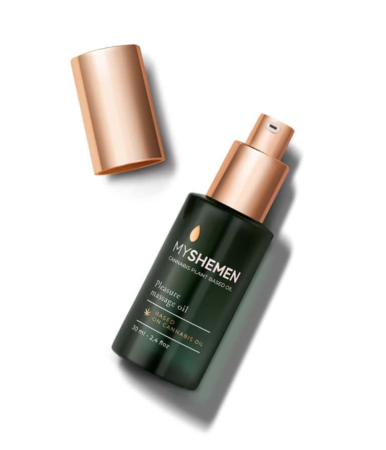 Elegant green glass bottle containing luxurious cosmetic oil beautifully featured in product photography cosmetics